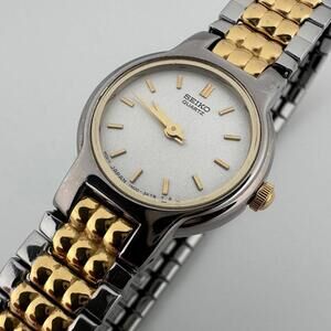 Seiko Womens Two Tone Silver Dial Quartz Stretch Bracelet Watch 1N00 3K78